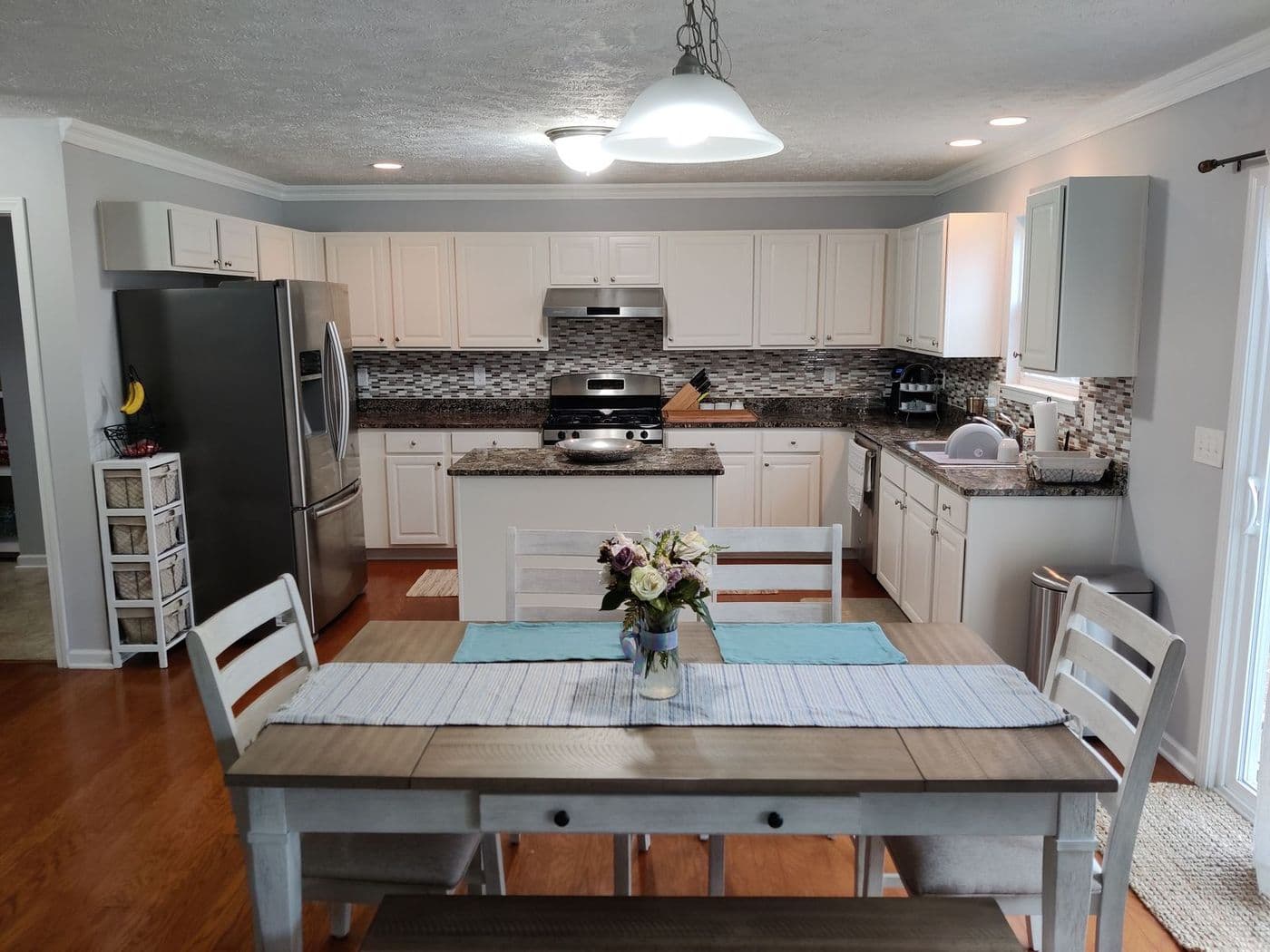 Refinished white kitchen cabinets in Northeast Ohio